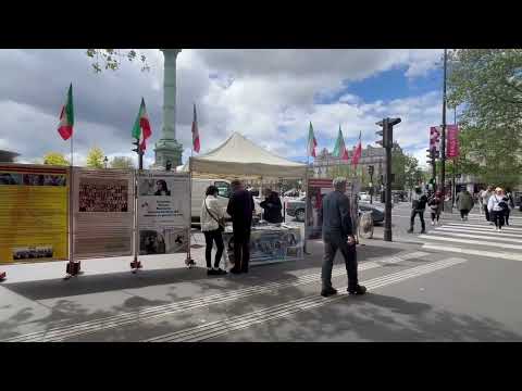 باريس – إقامة طاولة كتب ومعرض صور لشهداء الانتفاضة الإيرانية