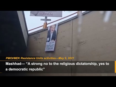 MEK Resistance Units call for Iran election boycott by installing a large banner of Massoud Rajavi