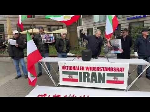 مونستر الألمانية - إقامة طاولة للكتب ومعرض لصور الشهداء احتجاجًا على الإعدامات في إيران