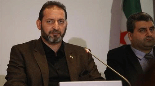 العقيد الركن فاتح حسون، المنشق عن النظام عضو وفد المعارضة