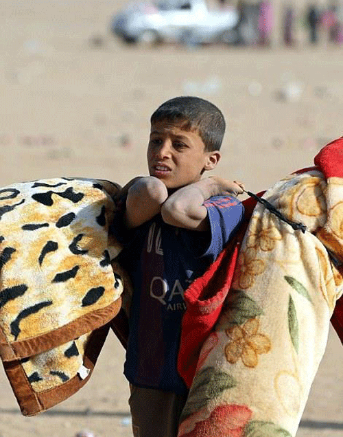 اطفال منكوبين في الموصل