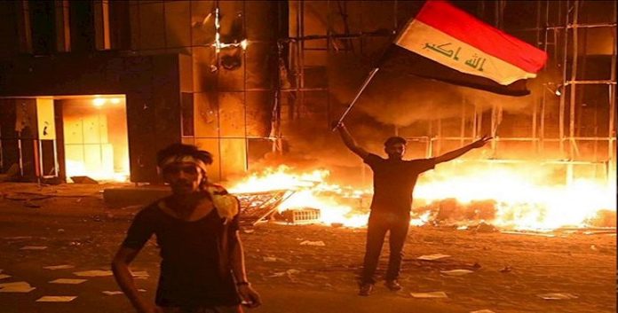 استمرار المواجهات في العراق وإحراق مقرات للقوات التابعة لنظام الملالي