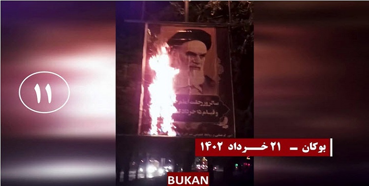 وسط ترحيب شعبي.. إضرام النار في صور خميني وخامنئي في طريق سعيدي السريع في طهران