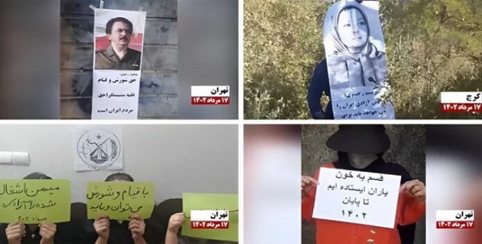 تحت شعار يمكن ويجب تحرير الوطن المحتل بالانتفاضة لصق لافتات من قبل وحدات المقاومة في مدن إيران