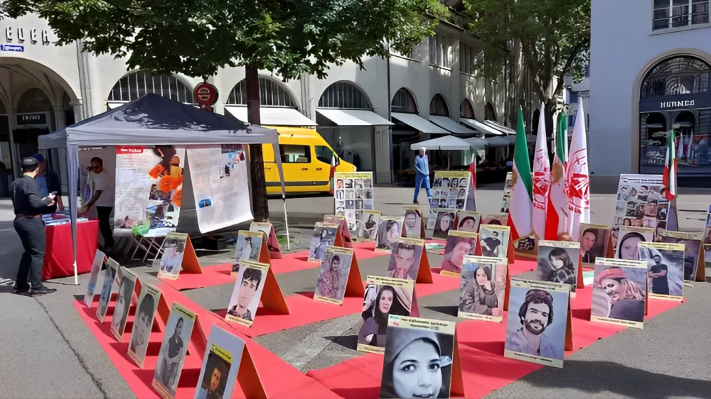 وقفة تضامنية لانصار مجاهدي خلق و إيرانيين احارا مع الانتفاضة الایرانیة في زيورخ