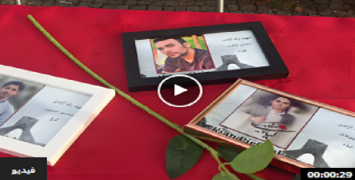 لإحياء ذكرى الانتفاضة الوطنية الوطنیة، معرض انصار مجاهدي خلق لصور شهداء الانتفاضة الإيرانية في برلين