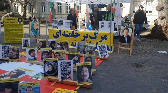 معرض انصارمجاهدي خلق لصور شهداء الانتفاضة الشعبية الایراینة في هايدلبرغ