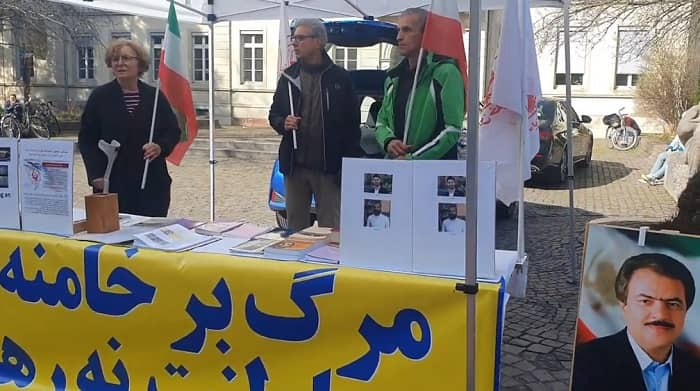 معرض انصارمجاهدي خلق لصور شهداء الانتفاضة الشعبية الایراینة في هايدلبرغ