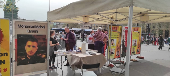 باريس – تقرير مصور لطاولة كتب ومعرض صور شهداء الانتفاضة الإيرانية