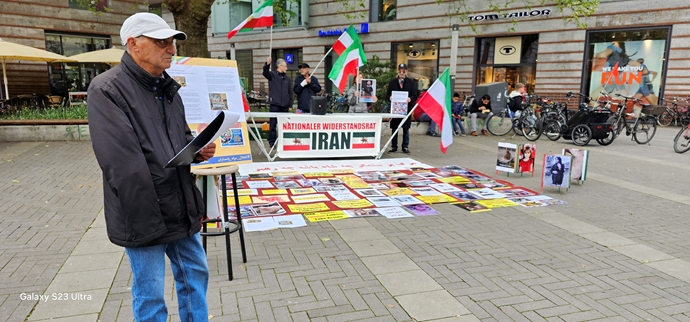 مونستر الألمانية – إقامة طاولة للكتب ومعرض لصور الشهداء احتجاجًا على الإعدامات في إيران
