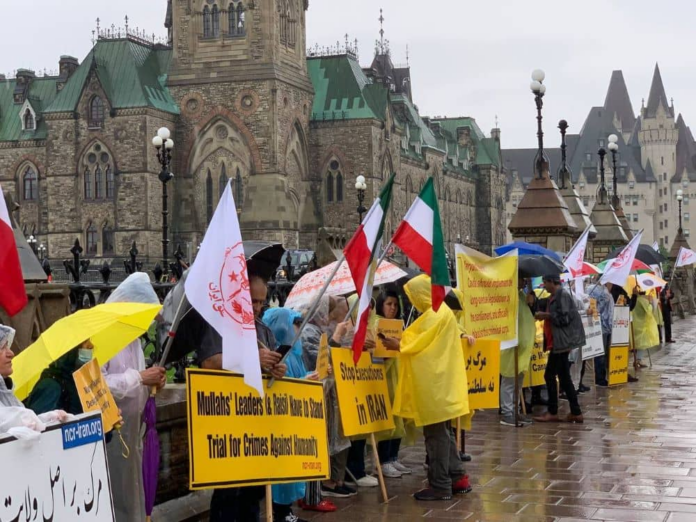 دعوة من جانب إيرانيون في أوتاوا من الحكومة الكندية إلى تصنیف حرس النظام الإیرانی في قائمة الارهاب