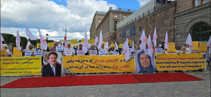تضامنا مع الانتفاضة الوطنية الایرانیة مظاهرات الإيرانيين و انصار مجاهدي خلق في ستوكهولم بالسويد– صور و ویدیوهات