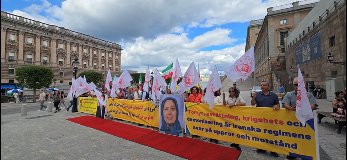تضامنا مع الانتفاضة الوطنية الایرانیة مظاهرات الإيرانيين و انصار مجاهدي خلق في ستوكهولم بالسويد– صور و ویدیوهات