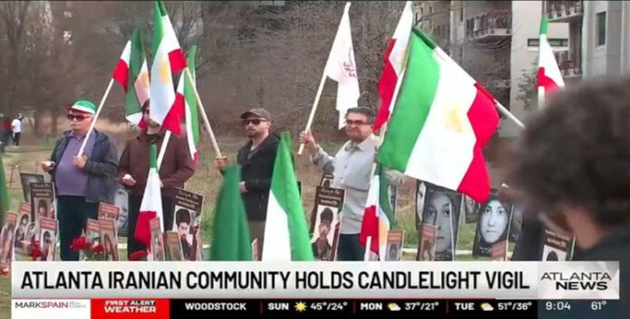 اضائة شموع التضامن في أتلانتا علی ید ایرانیون احرار دعماُ للمقاومة و رفض صریح للتدخل العسکري