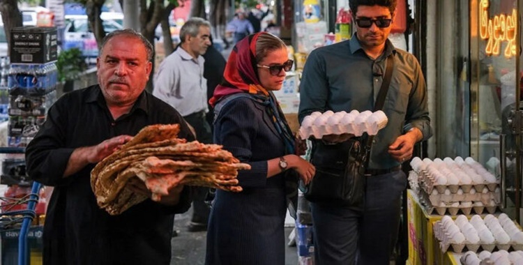 الضربة الهيكلية القاصمة الاقتصاد الایراني المنهك سلفاً الاقتصاد تحت أنقاض الحرب: انهيار هيكلي ومأزق معيشي يطحن الإيرانيين